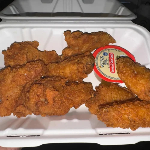 Chicken Wings - Crispy, flavorful chicken wings perfect for sharing.