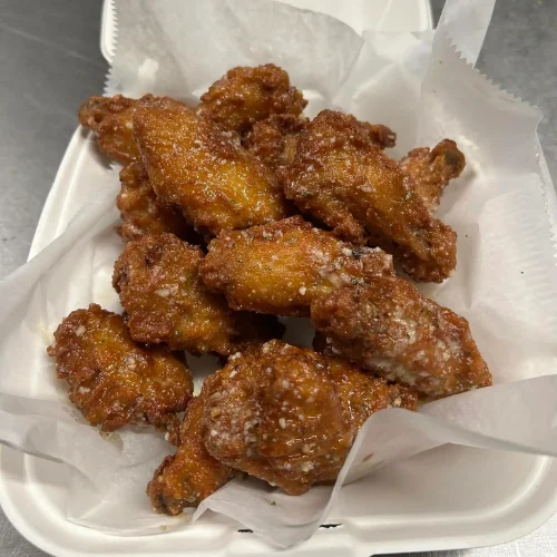 Garlic Parmesan Wings - Wings tossed in garlic butter and parmesan.
