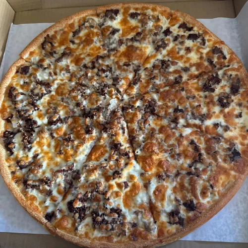 White Steak Pizza - White pizza topped with steak.